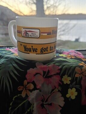 Vintage milk glass mug featuring the Home Hardware logo